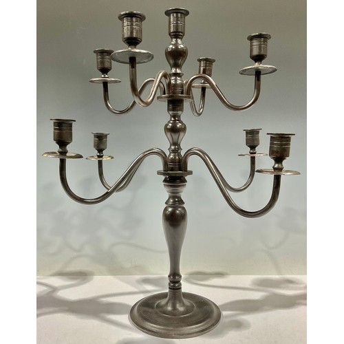 164 - A bronze eight branch candelabrum