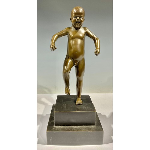 165 - A bronze figure of a boy