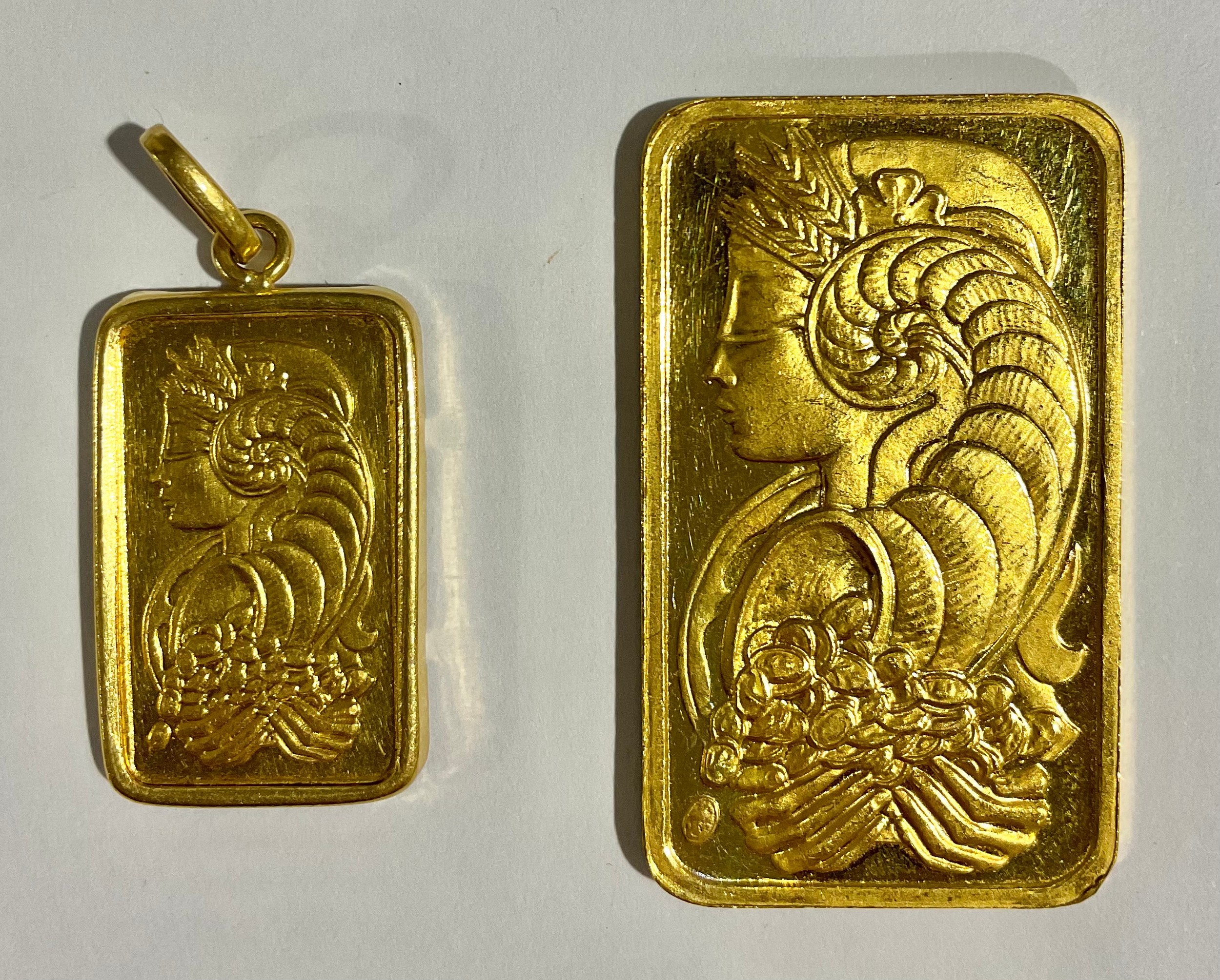 Suisse One Troy Ounce 999.9 Fine Gold A Suisse One Troy Ounce 999.9 Fine Gold ingot; a Suisse 10g Fine Gold