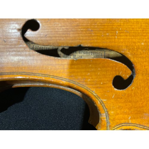 345 - A cased violin and bow, Stradivarius label