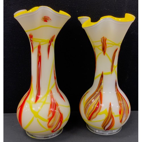 56 - A pair of Murano style frilled ovoid vases, in tones of yellow and red, 39cm high (2)