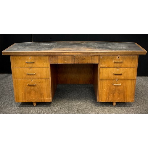 67 - A mid 20th century walnut veneered Register Office pedestal desk, by Carson’s Office Furniture, the ... 