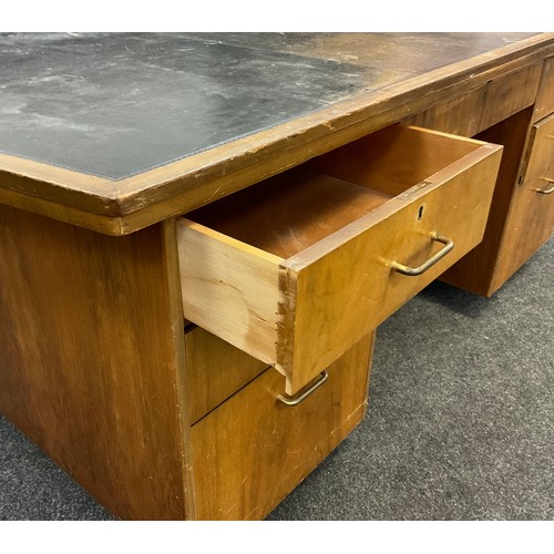 67 - A mid 20th century walnut veneered Register Office pedestal desk, by Carson’s Office Furniture, the ... 