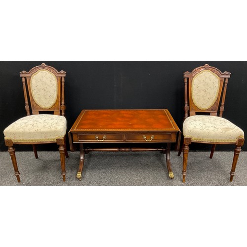 74 - A pair of Edwardian walnut bedroom chairs, carved and upholstered backs, turned and fluted legs;  a ... 