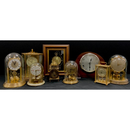 130 - Clocks - Schatz and Sohne Anniversary with floral face and glass dome, 16cm; others (9)