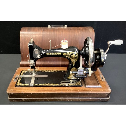 135 - A Frister and Rossmann hand crank sewing machine, serial number. 48225,c.1890