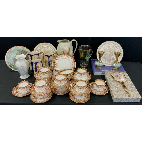 136 - An early 20th century Royal Albert tea set, for twelve, with floral collar, printed marks;  graduate... 