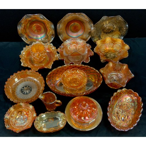 167 - A quantity of carnival glass including bowls, plates and lidded pots: etc