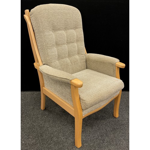 201 - A contemporary beechwood ‘Easy’ armchair, 107cm high x 75cm wide.