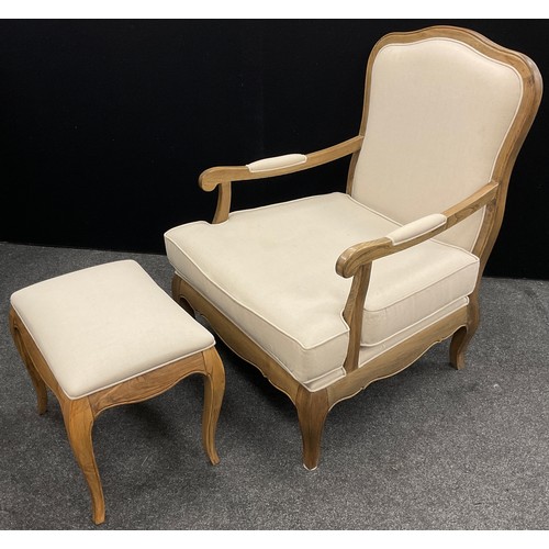 211 - A pair of French Provincial style deep-seated elm armchairs, and a conforming footstool, the chairs ... 