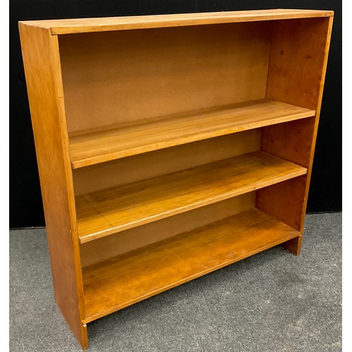 223 - A pine open bookcase, three tiers of deep shelving, 112cm high x 114.5cm wide x 30.5cm deep.