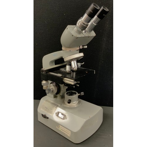 229 - A Kyowa compound binocular microscope, no. 764949.