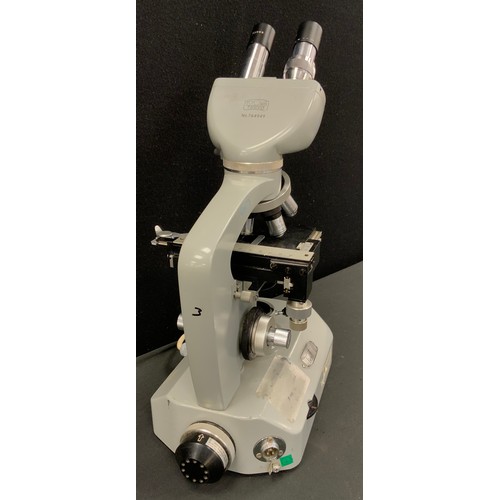 229 - A Kyowa compound binocular microscope, no. 764949.