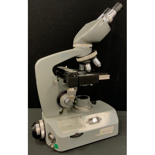 229 - A Kyowa compound binocular microscope, no. 764949.