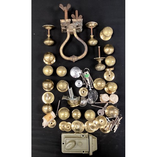 242 - A quantity of Sadler door knobs, a lock and door knocker, approx.20