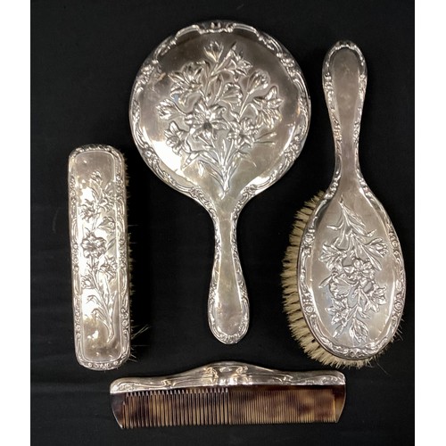 246 - A three piece silver dressing table set including mirror, brush, others, Chester,1901