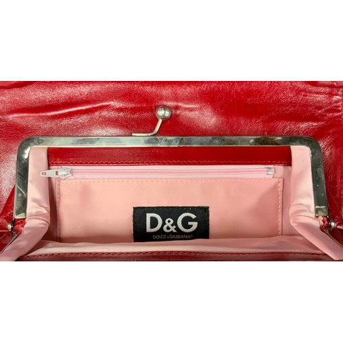 273 - A Dolce & Gabbana red leather crocodile skin effect handbag, chain link shoulder strap, pink lined t... 