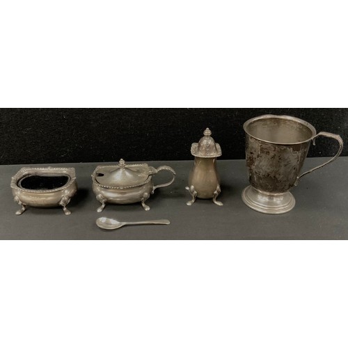 294 - A silver christening cup, Birmingham 1977, 2.43ozt;  four piece silver cruet set, open salt, pepper,... 