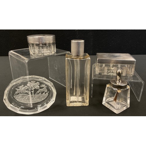 295 - A French Maquet Paris silver topped cut glass three piece part dressing table set, scent bottle, rec... 