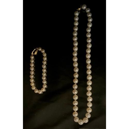 306 - A J Kohle Akoya single strand cultured creamy white 50 pearl necklace, individually knotted approx 9... 