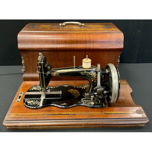 218A - A Iodhlann hand crank sewing machine, reg no.21214656, c.1910