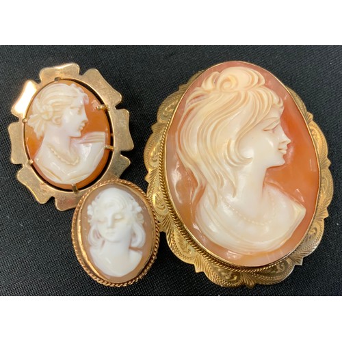 355 - A Victorian style oval cameo brooch, 9ct gold mount, Birmingham 1992, another smaller, Birmingham 19... 