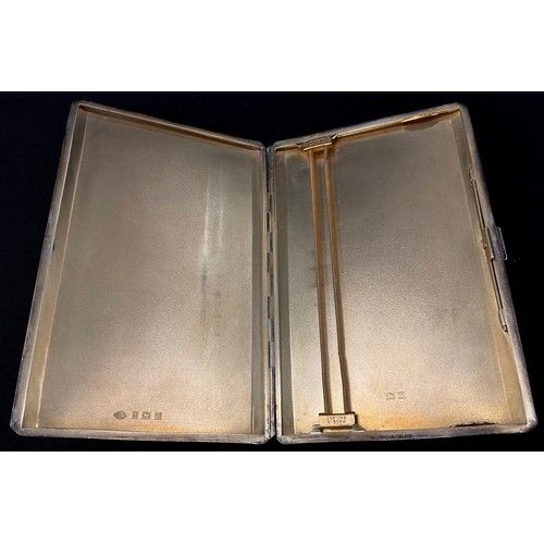 375 - A rectangular silver engine turned cigarette case, gilt interior, Addie Brothers, Birmingham, 1957, ... 