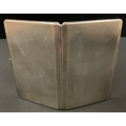 375 - A rectangular silver engine turned cigarette case, gilt interior, Addie Brothers, Birmingham, 1957, ... 