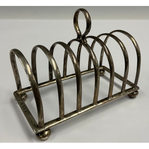 126 - A silver seven bar toast rack, by Adie Brothers, Birmingham