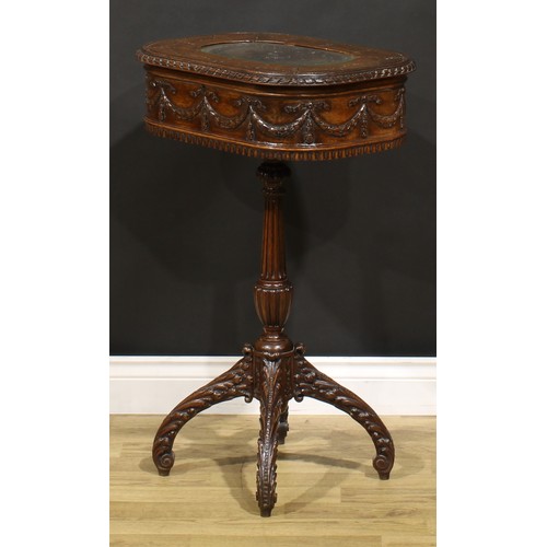 115 - An Adam Revival mahogany work table, hinged top above a deep frieze carved and applied with ribbon-t... 