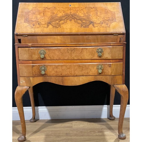 119 - An early 20th century Queen Anne style walnut bureau, fall front enclosing a fitted interior above t... 