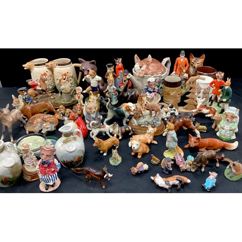 122 - A quantity of model foxes including Beswick, Border Fine Arts, Royal Worcester; others