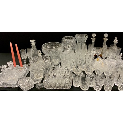 143 - Glassware - a quantity of 19th century and later glass including decanters, vases, etched glass, cut... 