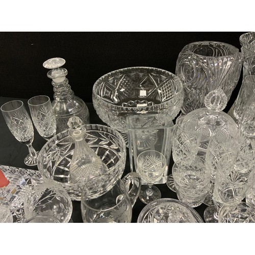 143 - Glassware - a quantity of 19th century and later glass including decanters, vases, etched glass, cut... 