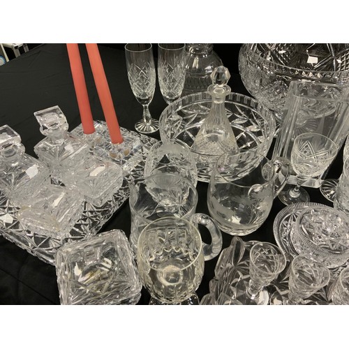 143 - Glassware - a quantity of 19th century and later glass including decanters, vases, etched glass, cut... 