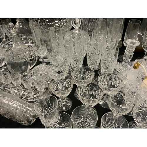 143 - Glassware - a quantity of 19th century and later glass including decanters, vases, etched glass, cut... 