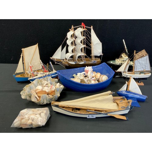 153 - A Novelty stationary model sail boat,  others,  assorted shells etc