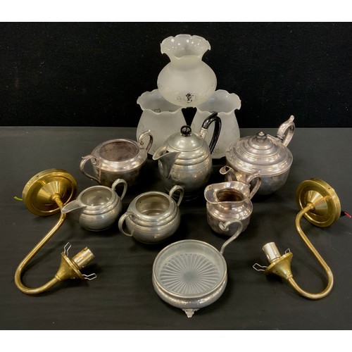 183 - A Silverplated three piece tea set,  four piece pewter tea set, pair of brass single branch wall lig... 