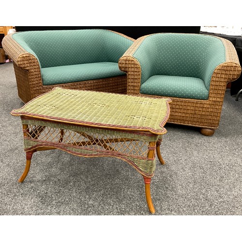 191 - A cane conservatory suite, comprising sofa, measuring 77cm high x 160cm x 90cm, single armchair, and... 