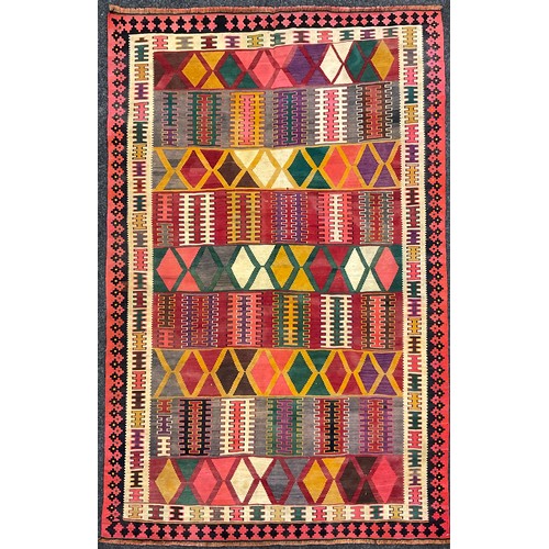 195 - A South West Persian Qashgai Kilim rug, hand-knotted with geometric design in multiple colours, 245c... 