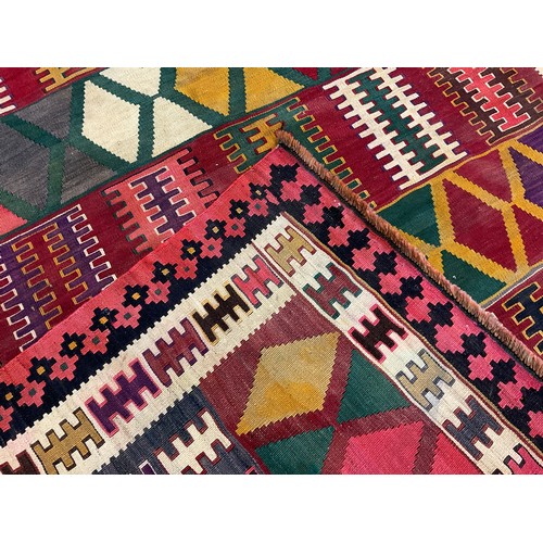 195 - A South West Persian Qashgai Kilim rug, hand-knotted with geometric design in multiple colours, 245c... 