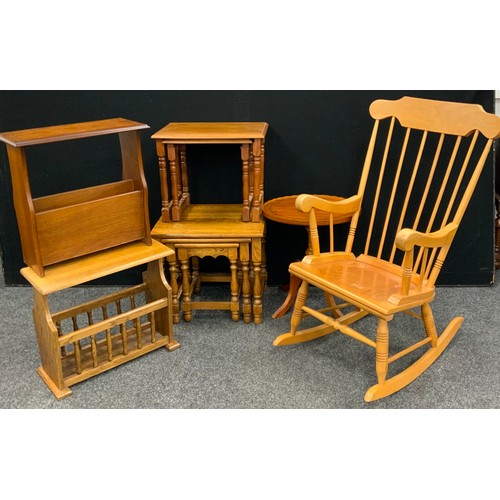 197 - A Beech wood spindle-back rocking chair;  nest of three oak side tables;  yew wood tripod occasional... 