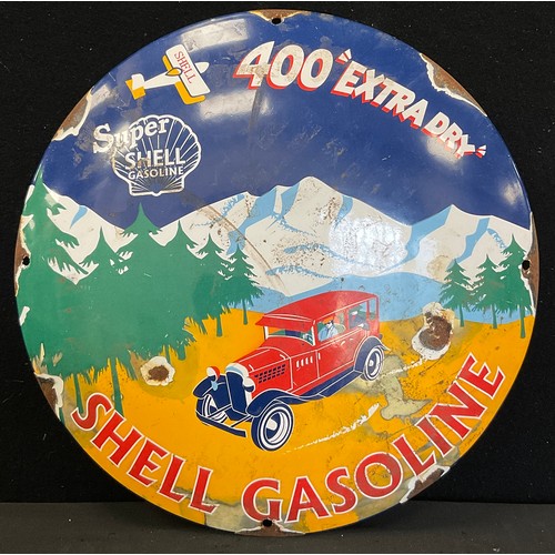 229 - A reproduction enamel Shell Gasoline sign, 29cm dia