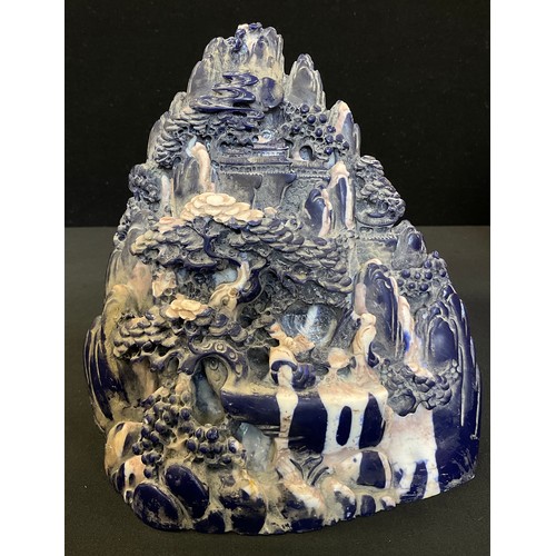 244 - Chinese blue faux lapis lazuli stone carving of village scene, 18cm high