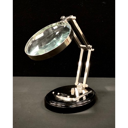 254 - A Chrome magnifier on stand, 24cm high