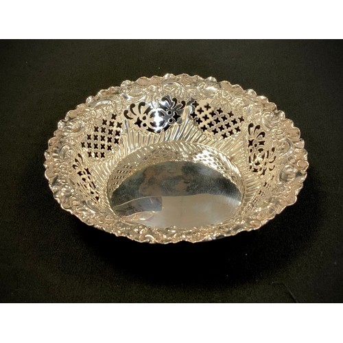 295 - A late Victorian silver bonbon dish pierced and embossed rim, Fenton Brothers, Sheffield 1894, 11.3c... 