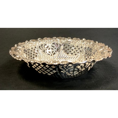 295 - A late Victorian silver bonbon dish pierced and embossed rim, Fenton Brothers, Sheffield 1894, 11.3c... 