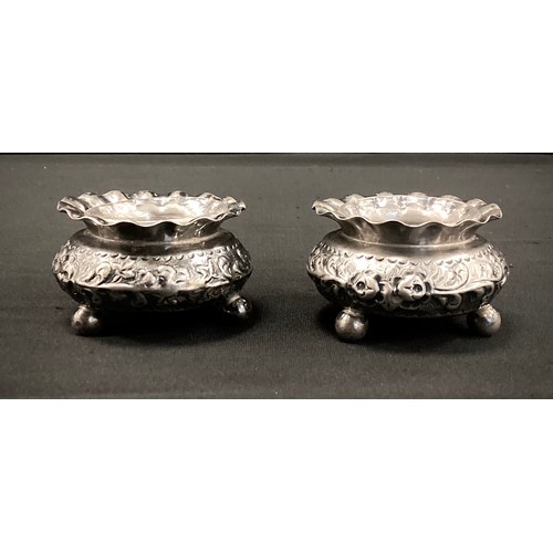 298 - A pair of Victorian silver table salts, clear glass liners, Nathan & Hayes, Birmingham 1887, 86.4g g... 