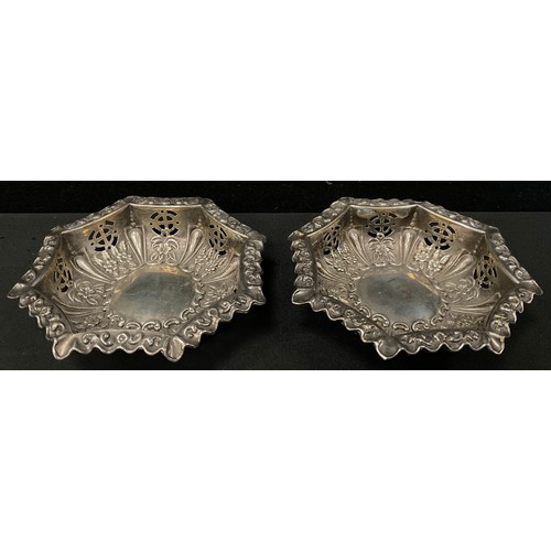 308 - A pair of Edwardian silver pierced and embossed inverted octagonal bonbon dishes, Birmingham 1903, 1... 