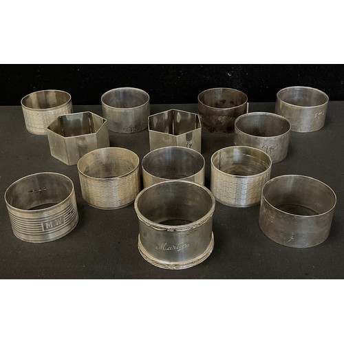 309 - A set of six Walker and Hall silver napkin rings, Sheffield 1944; others assorted , approx.320.8g (1... 